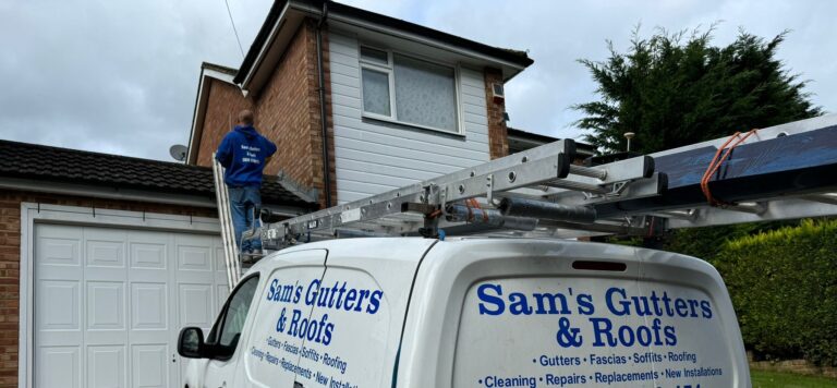 Roofer is inspecting the roof